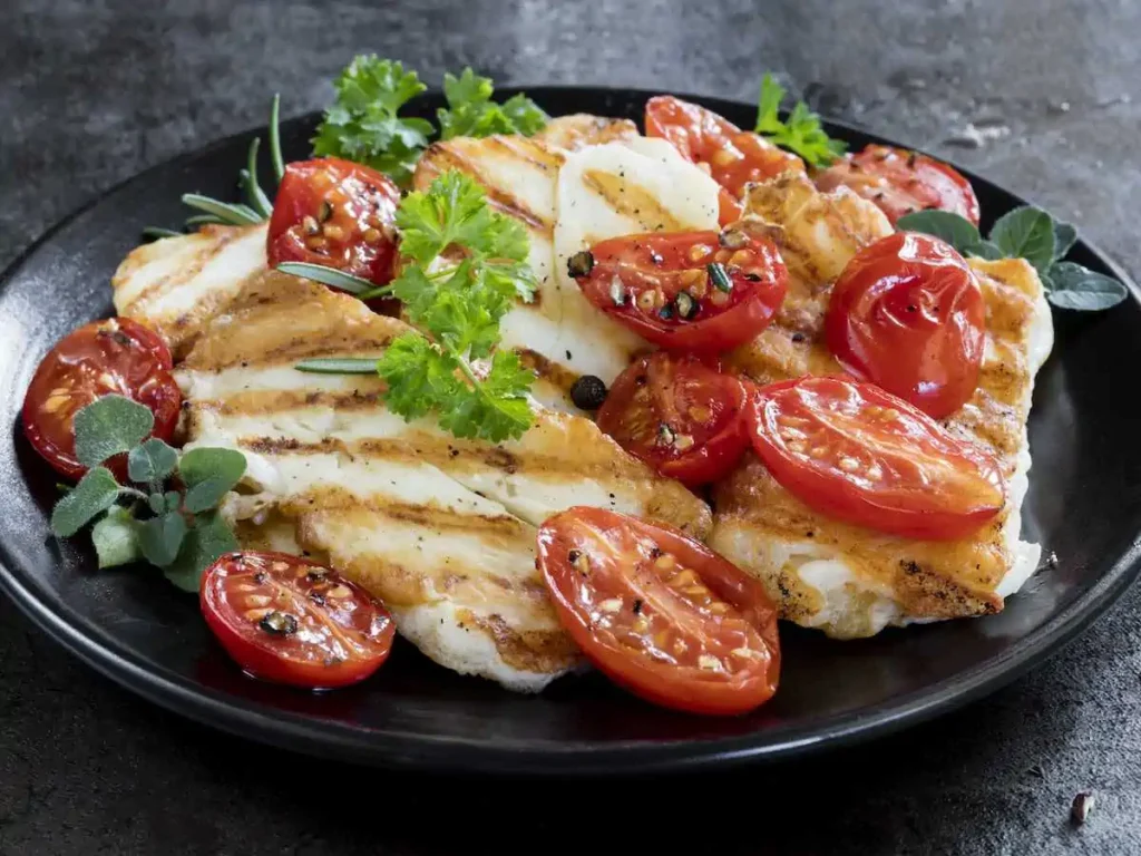 Halloumi cheese in a bowl with tomatoes